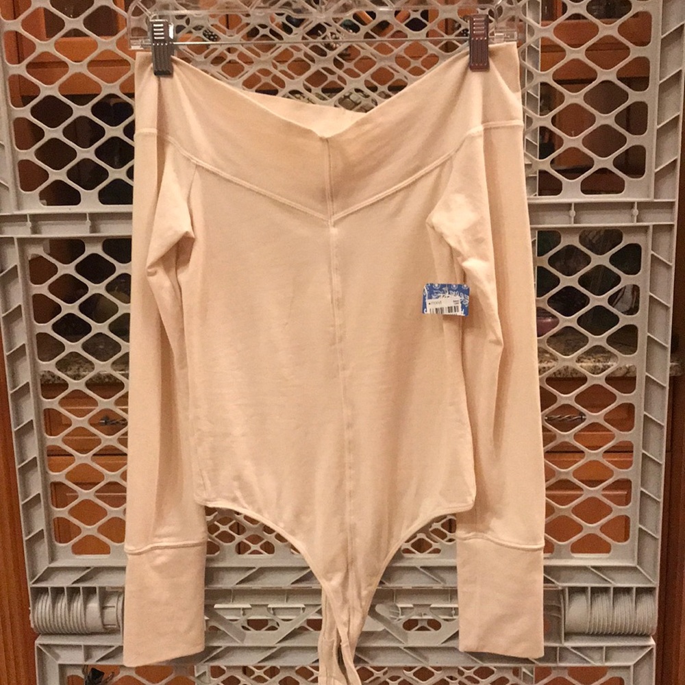 Ladies cream colored body suit long sleeve